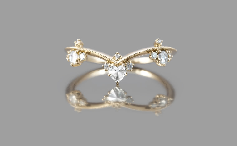 Engagement ring with heart on band 2025
